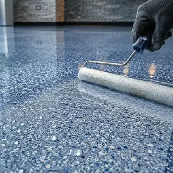 Protective topcoat applied to decorative resin flooring for easier maintenance